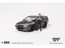 NISSAN SKYLINE GT-R (R32) NISMO NISMO GUNMETAL WITH TSUGIO MATSUDA 1992 -1:64 - Mini GT