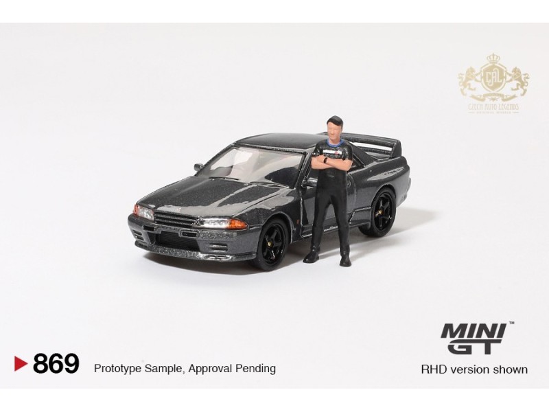NISSAN SKYLINE GT-R (R32) NISMO NISMO GUNMETAL WITH TSUGIO MATSUDA 1992 -1:64 - Mini GT